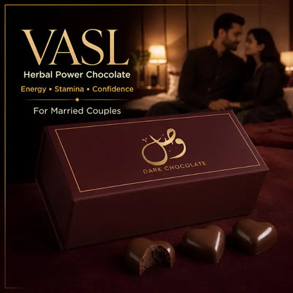 A dark chocolate gift box with gold lettering sits on a dark red surface, with three chocolate pieces in front and a softly blurred couple in a bedroom in the background. Text on the left reads 'VASL Herbal Power Chocolate' and 'For Married Couples'.